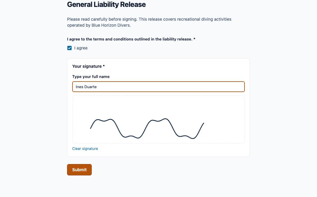 A liability release being signed: the agreement box ticked, the diver's name typed, and a signature drawn on the pad below it.